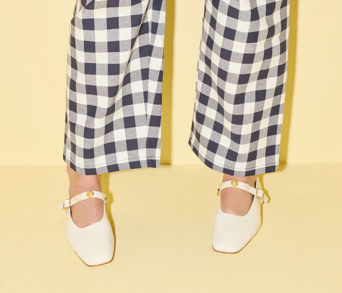 Freda Salvador Jane Mary Jane flat shoe with gold shell accents and bone-colored straps, stylish and comfortable for everyday wear.