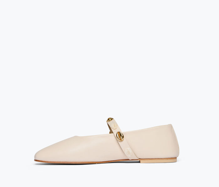 Freda Salvador Jane Mary Jane flat shoe with gold shells interior and bone-colored exterior, stylish and comfortable footwear.