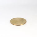 Japanese Brass Coaster made in Toyama on white background.