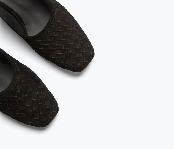 Black suede Jayla woven ballet heel by Freda Salvador with intricate woven detailing and a sleek, elegant design.