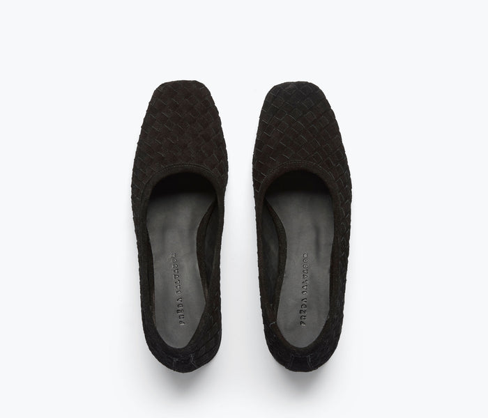 Black suede Jayla woven ballet heel by Freda Salvador with a pointed toe and elegant woven detail on the upper.