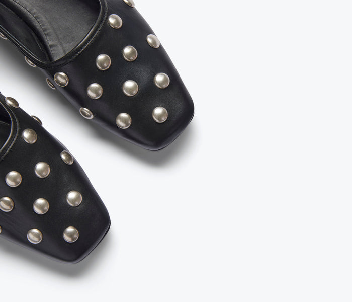 Black Jessie ballet flat by Freda Salvador with sleek design and subtle stitching detail, perfect for casual or dressy wear.