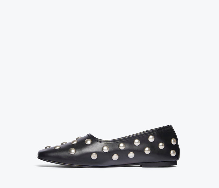 Freda Salvador Jessie ballet flat in black shown from inside view, featuring soft insole and sleek, stylish design.