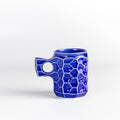 Large Cobalt Blue Ceramic Jincup from Akihiro Woodworks is a collaboration with One Kiln Ceramics utilizing porcelain mud casting and local wood ash in the glaze to achieve the color. Each mug is slightly different from another. Made by Akihiro Woodworks in Kagoshima, Japan.