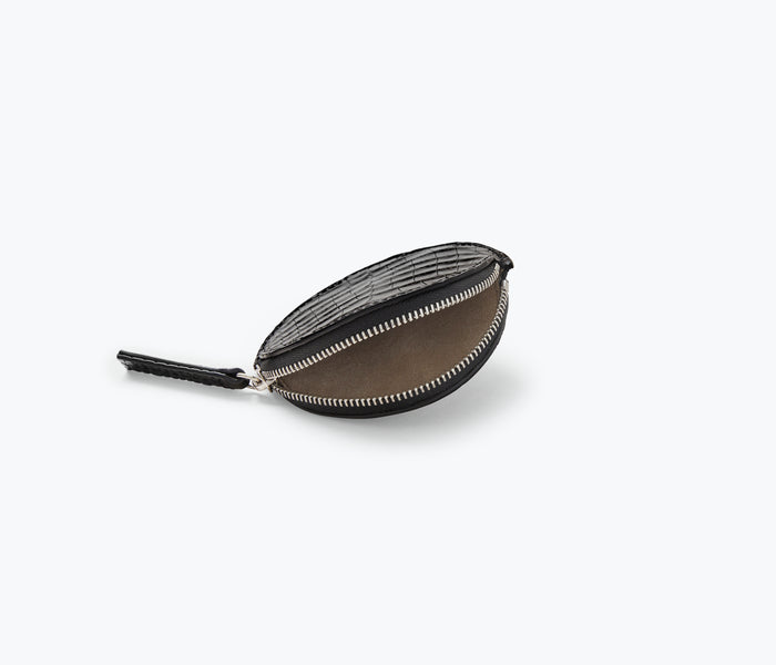 Freda Salvador JO Small Circle Pouch inside view showing compact bag with interior compartments and stylish design.