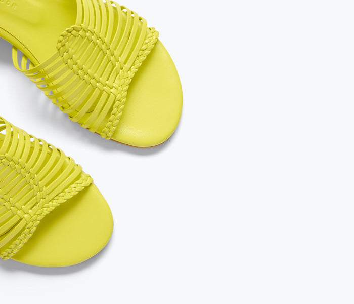 Freda Salvador Judy block-heeled sandal with neon calf detail, showcasing a stylish heel and vibrant design.