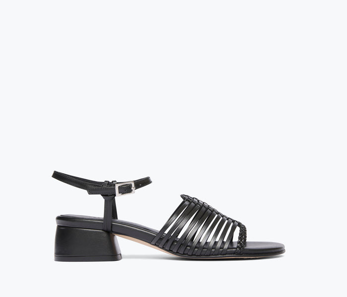 Black Judy woven block heel sandal by Freda Salvador, front view showing woven strap detail and sturdy heel.