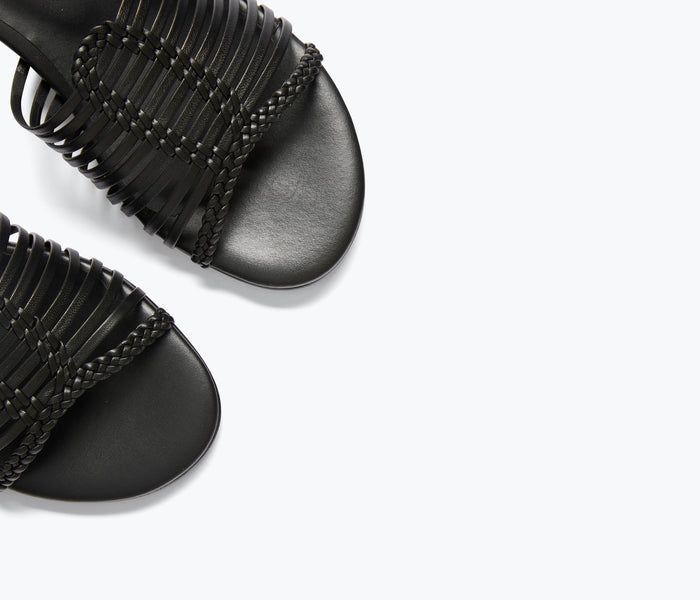 Black Judy woven block heel sandal by Freda Salvador, featuring a detailed calf leather strap and woven design.