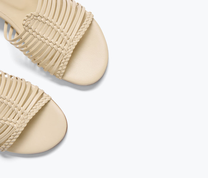 Freda Salvador Judy woven block heel sandal in vanilla calf leather with detailed woven strap design.