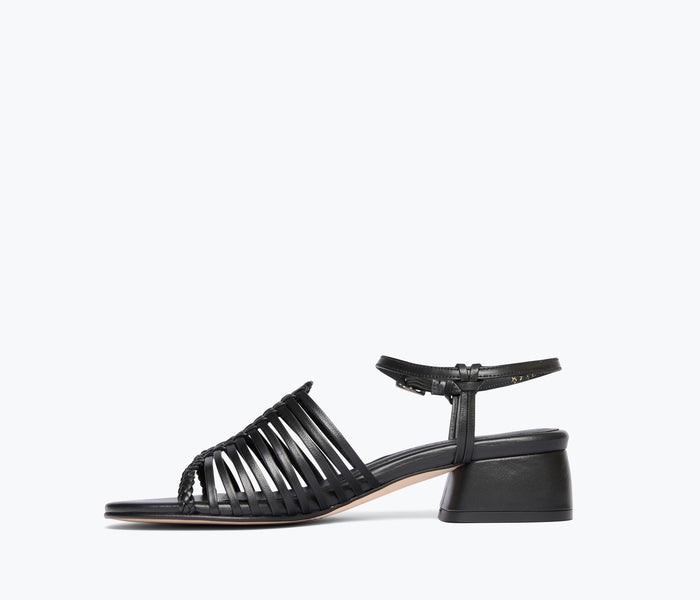 Black Judy woven block heel sandal by Freda Salvador, showing inside view with calf leather straps and woven detail.