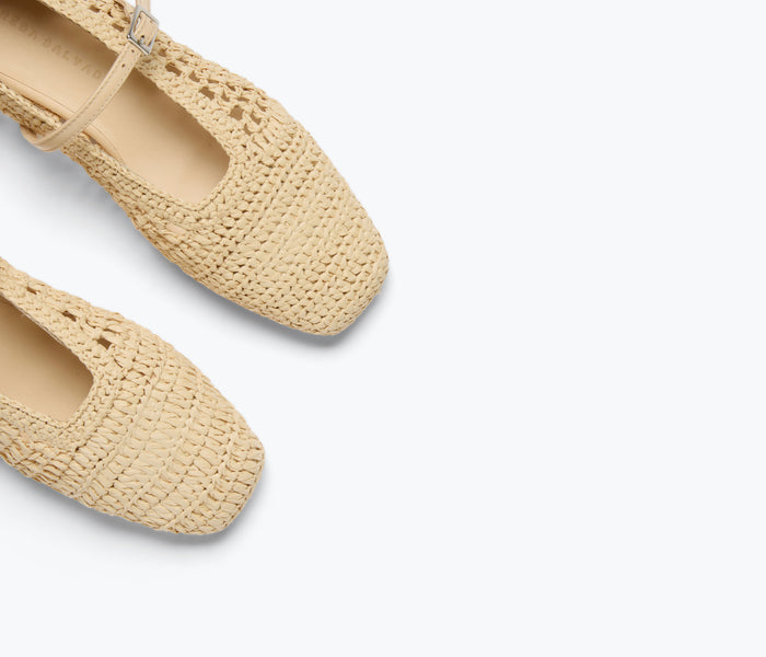 Freda Salvador Jules Mary Jane flat in natural raffia with woven detail, featuring a classic Mary Jane strap and comfortable flat sole.