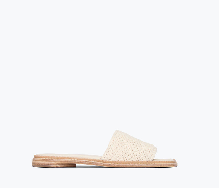 Freda Salvador Juno crochet sandal in vanilla color with front view showing woven crochet straps and open toe design.