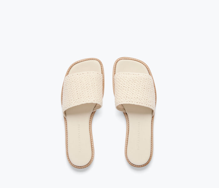 Freda Salvador Juno crochet sandal in vanilla with woven crochet upper and flat sole, stylish and comfortable footwear.
