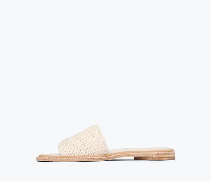 Inside view of Freda Salvador Juno crochet sandal in vanilla with woven crochet detailing and comfortable footbed.