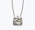 Black snake-patterned mini purse necklace by Freda Salvador, featuring a compact bag design with a sleek chain necklace.