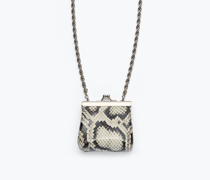 Black snake-patterned mini purse necklace by Freda Salvador, featuring a compact bag design with a sleek chain necklace.