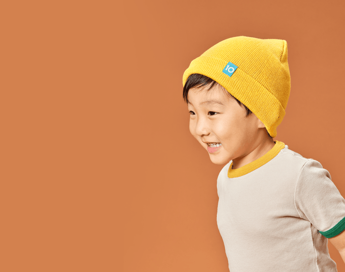 Little boy wearing Ten Little Knit Beanies Mariegold Yellow - Available at www.tenlittle.com