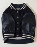 Black leather letterman jacket for dogs, combining style and comfort for your pet.