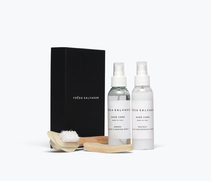 Freda Salvador leather care kit for suede with shoe cleaner bottle and accessories, designed for cleaning and maintaining suede shoes.
