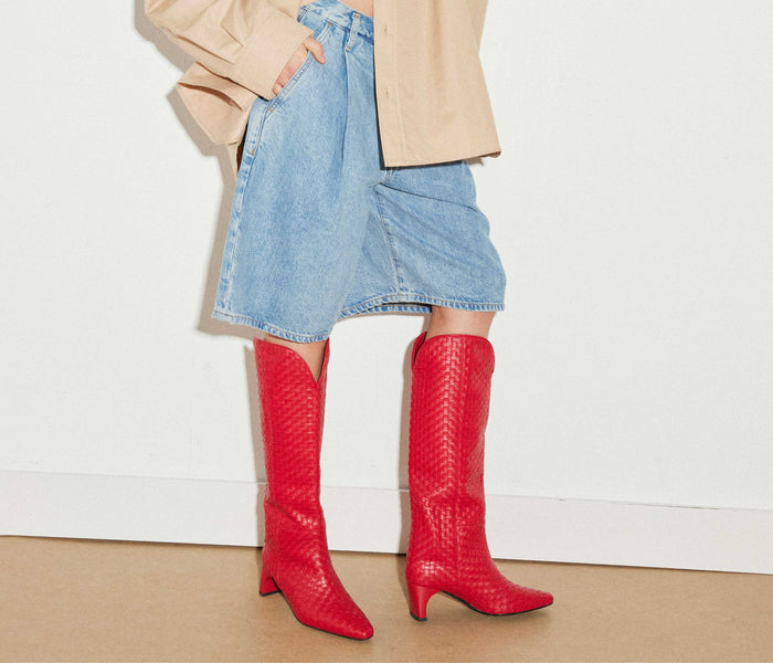 Red Lennox Woven Tall Boot by Freda Salvador featuring intricate woven leather design and a sleek silhouette.
