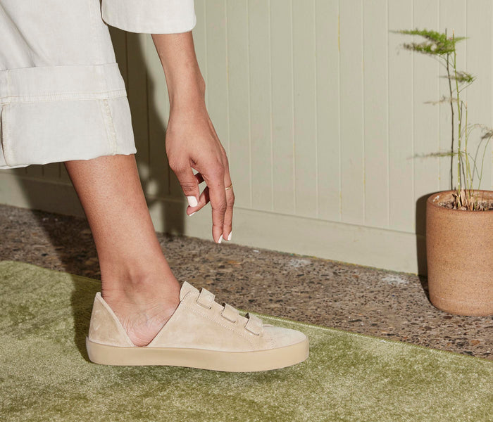 Freda Salvador Libby D'Orsay sneaker in stucco color with sleek design and white sole, showcasing stylish casual footwear.