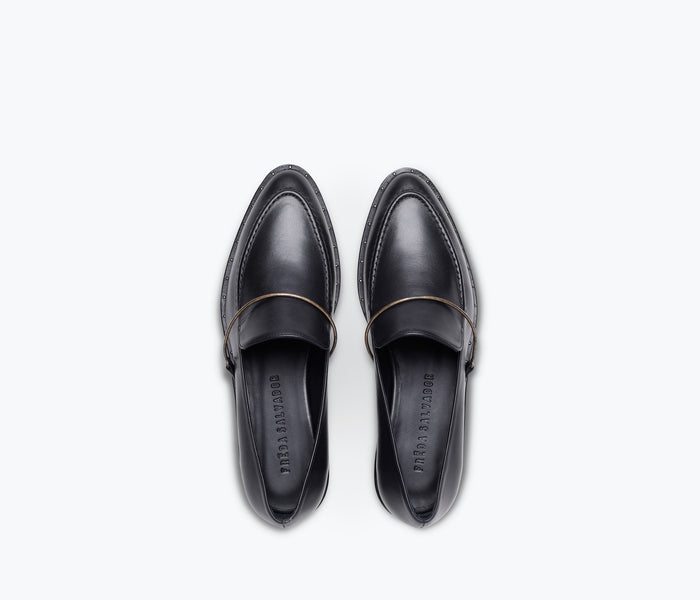 FRĒDA SALVADOR Light Halo Loafer showcasing a stylish slip-on shoe in a neutral tone with sleek design details.