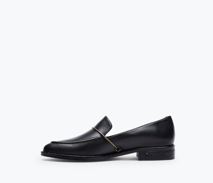 FRĒDA SALVADOR Light Halo Loafers shown from the front, featuring sleek design and stylish detailing on a neutral background.