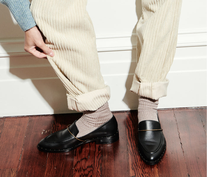 Black FRĒDA SALVADOR Light Halo Loafer featuring sleek leather design and subtle stitching details.