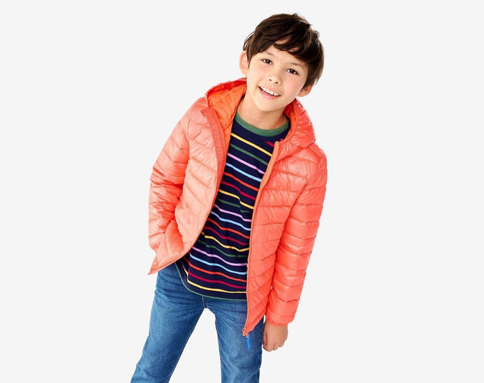 Child wearing Primary - Lightweight Puffer Jacket - Clementine - Available at www.tenlittle.com