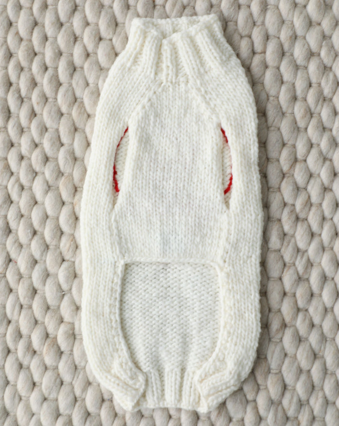 Pink knit Love Notes Dog Sweater perfect for Boston Terriers, Pomeranians, and Shih Tzus. Ideal for chilly spring or romantic outings.