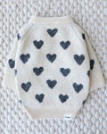 Soft knit dog sweater with an allover heart pattern, ideal for cooler walks and lounging, loved by dachshunds and cavapoos