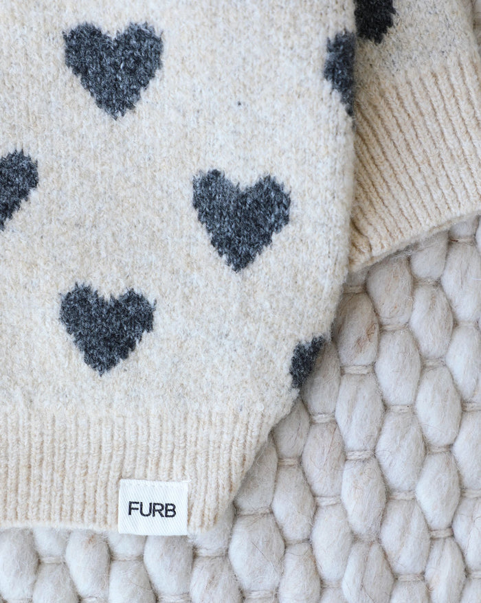 Playful heart patterned dog sweater designed for comfort and movement, perfect for beagles and mixed breeds