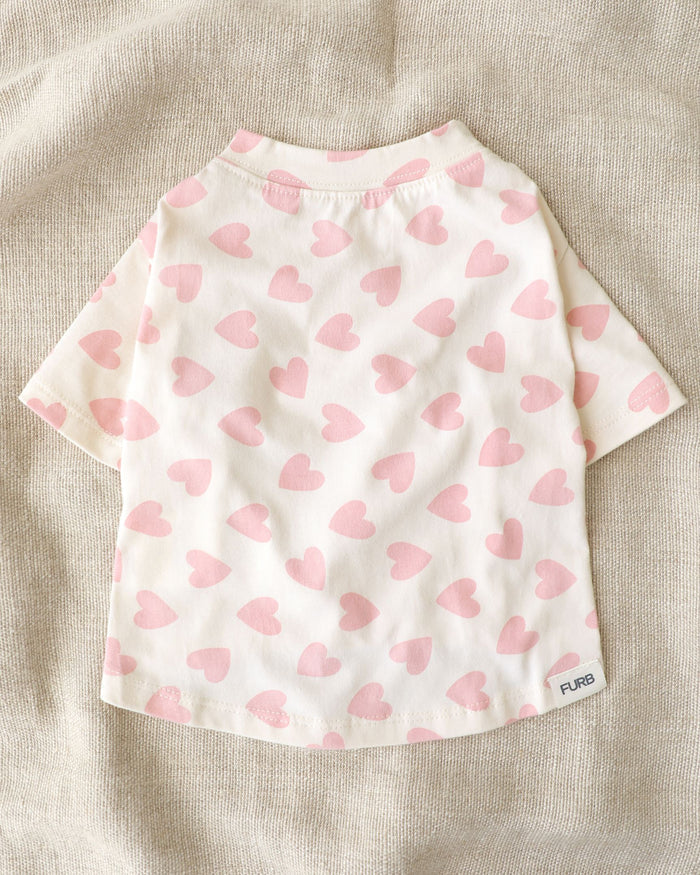 Pink heart print dog t shirt with sweet romantic pet fashion style. Updated May 2026.