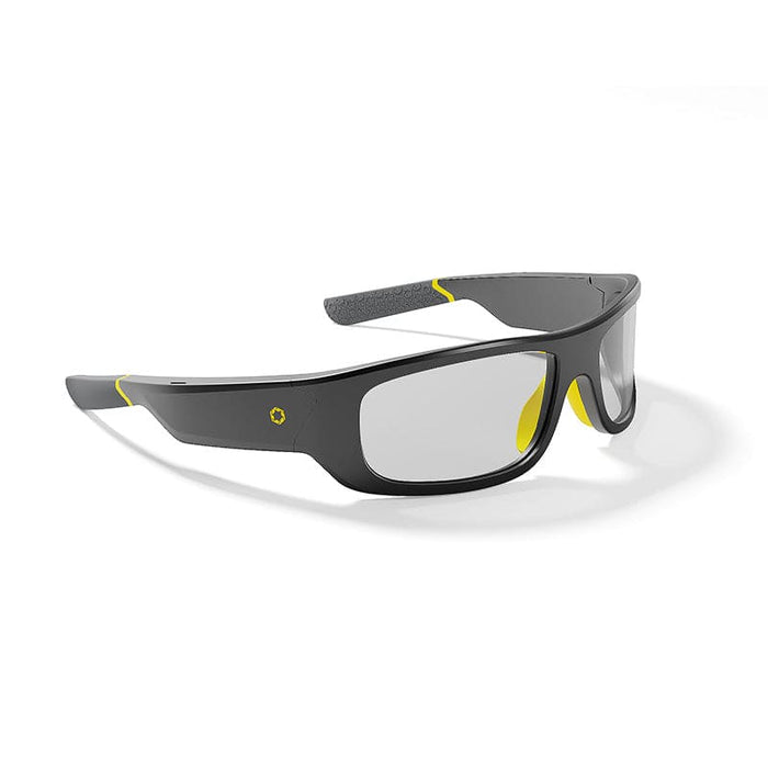 A pair of Lucyd Armor | Photochromic safety glasses by Lucyd, featuring a sporty black and gray design with clear lenses and yellow temple accents, displayed on a white background.