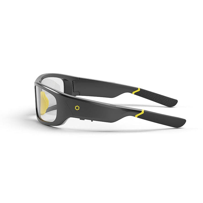 The Lucyd Armor | Photochromic by Lucyd features black and yellow sports frames with clear UV400 polarized lenses, black arms with yellow accents and textured tips, shown on a white background at a three-quarter rear angle.