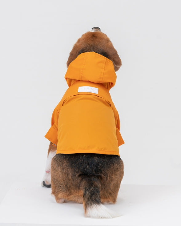 Bright yellow dog raincoat with adjustable fit straps and lightweight design, ideal for Beagles, Pugs, Boston Terriers, and outdoor loving pups