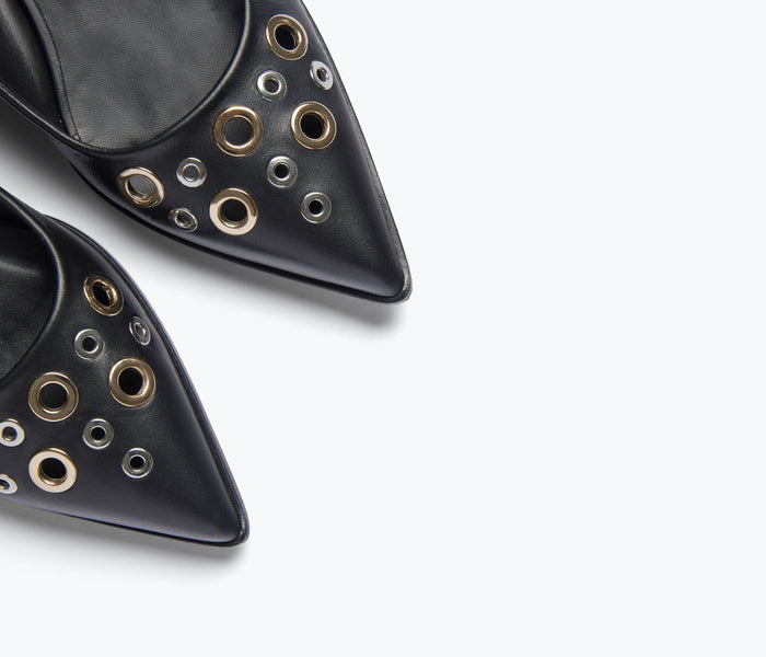 Black Marie slingback point flats by Freda Salvador with grommet details, stylish and comfortable women's flat shoes.