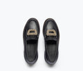 Freda Salvador Mateo crystal penny loafer in black leather with sparkling crystal accents on the top.