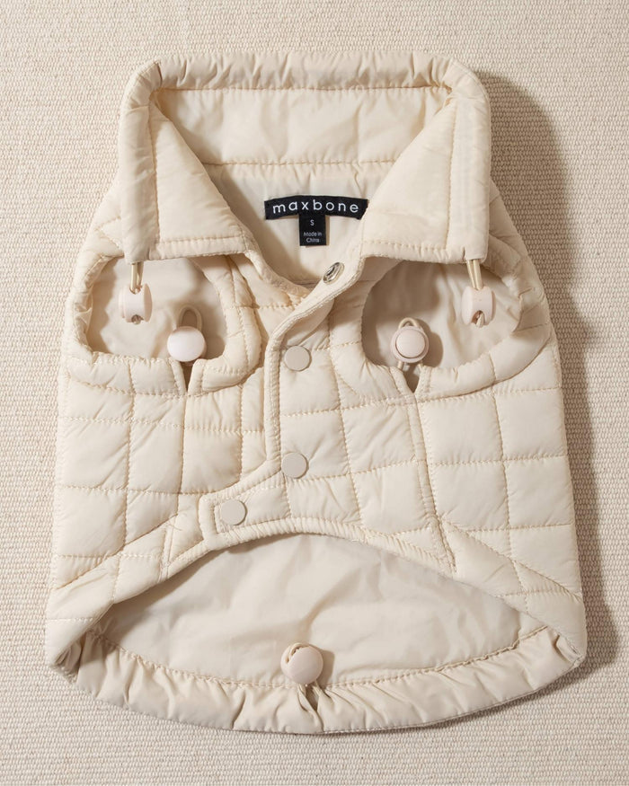 perfect on its own or layered with a cute sweater. This quilted, stylish jacket is fully adjustable, with coordinating sand cords on the hem, neck, and arm openings. Jacket can be worn over harness, with a small opening for leash attachment on the back. Asymmetrical buttons also make for more secure wear, for even the most portly of pups!. pug lightweight jacket