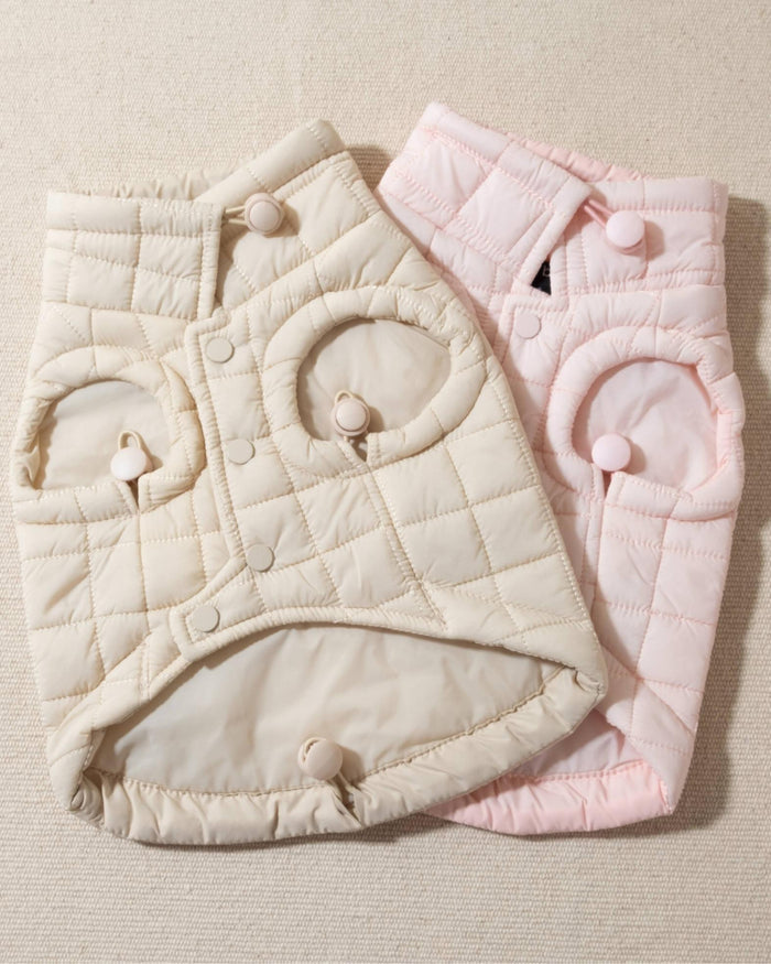 perfect on its own or layered with a cute sweater. This quilted, stylish jacket is fully adjustable, with coordinating sand cords on the hem, neck, and arm openings. Jacket can be worn over harness, with a small opening for leash attachment on the back. Asymmetrical buttons also make for more secure wear, for even the most portly of pups!. frenchie dog lightweight jackets