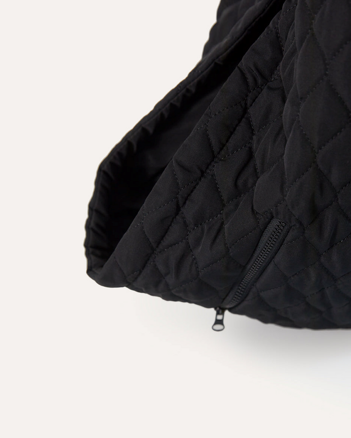 Recycled nylon black dog carrier sling that packs into a convenient pouch for small dogs up to 10 pounds