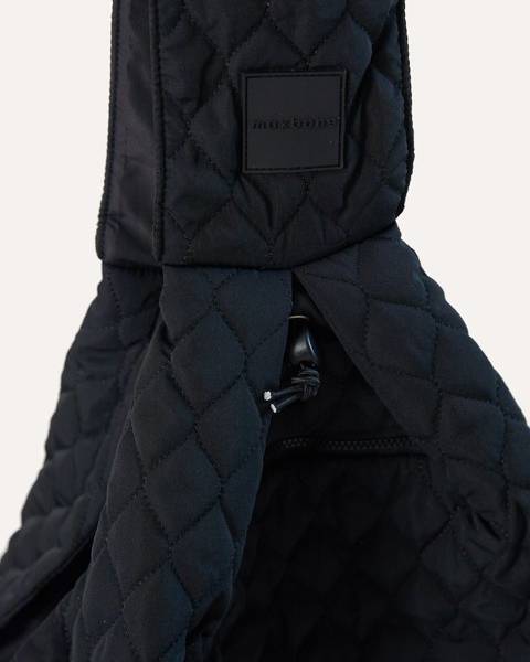 Functional eco-friendly black dog carrier with recycled nylon, secure drawstrings and comfortable fit for small dogs up to 10 pounds