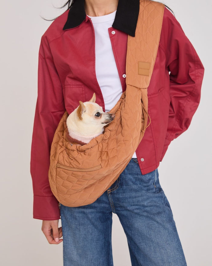 Camel eco-friendly dog sling carrier made from recycled nylon with secure drawstrings and safety latch for small dogs up to 10 pounds