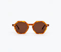 Sardine Millie sunglasses with round frames and Carmelo Glaze finish, stylish accessories for sun protection and fashion.