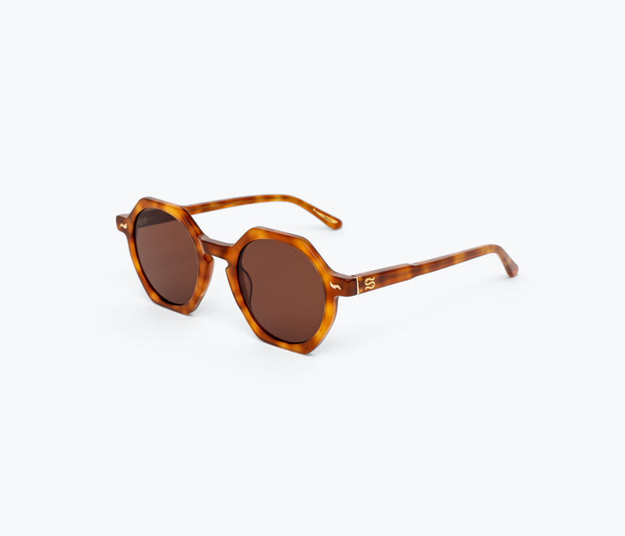 Sardine Millie sunglasses with round frames and Carmelo Glaze finish, stylish accessories for trendy eye protection.