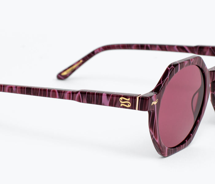 Sardine Millie sunglasses with midnight boogie frames, featuring dark tinted lenses and stylish, modern accessory design.