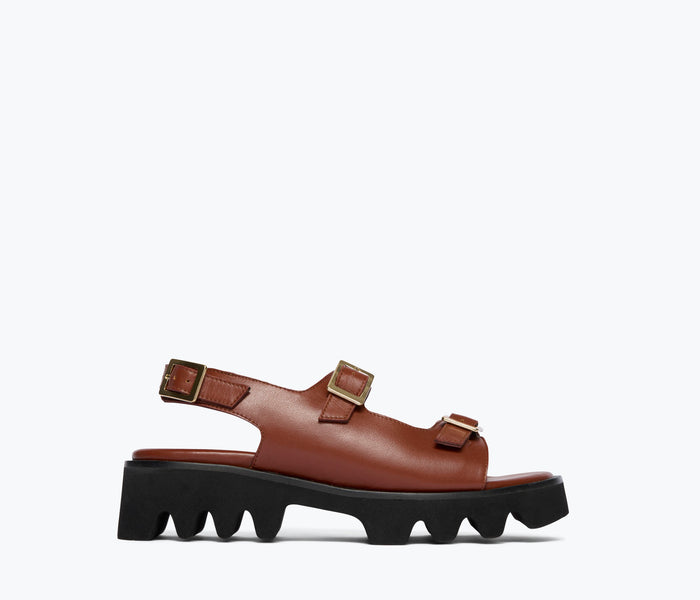 Freda Salvador Mindy Lug Sole Sandal in chocolate calf leather, front view showing chunky lug sole and sleek strap design.