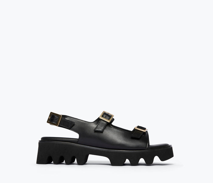 Black Mindy Lug Sole Sandal by Freda Salvador, front view showing chunky sole and stylish strap design.