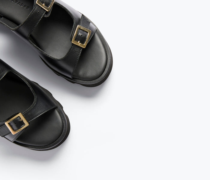Black Mindy Lug Sole Sandal by Freda Salvador with calf leather straps and chunky lug sole detail.