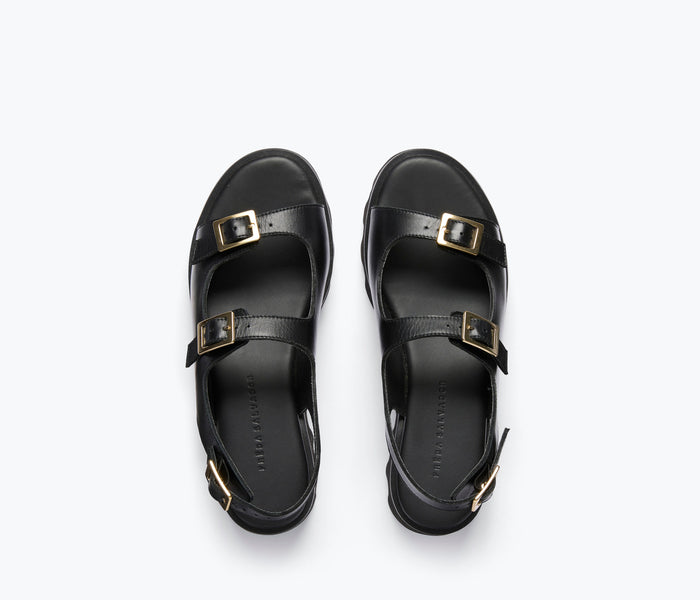 Freda Salvador Mindy Lug Sole Sandal in black with calf leather straps and chunky lug sole, shown from top view.